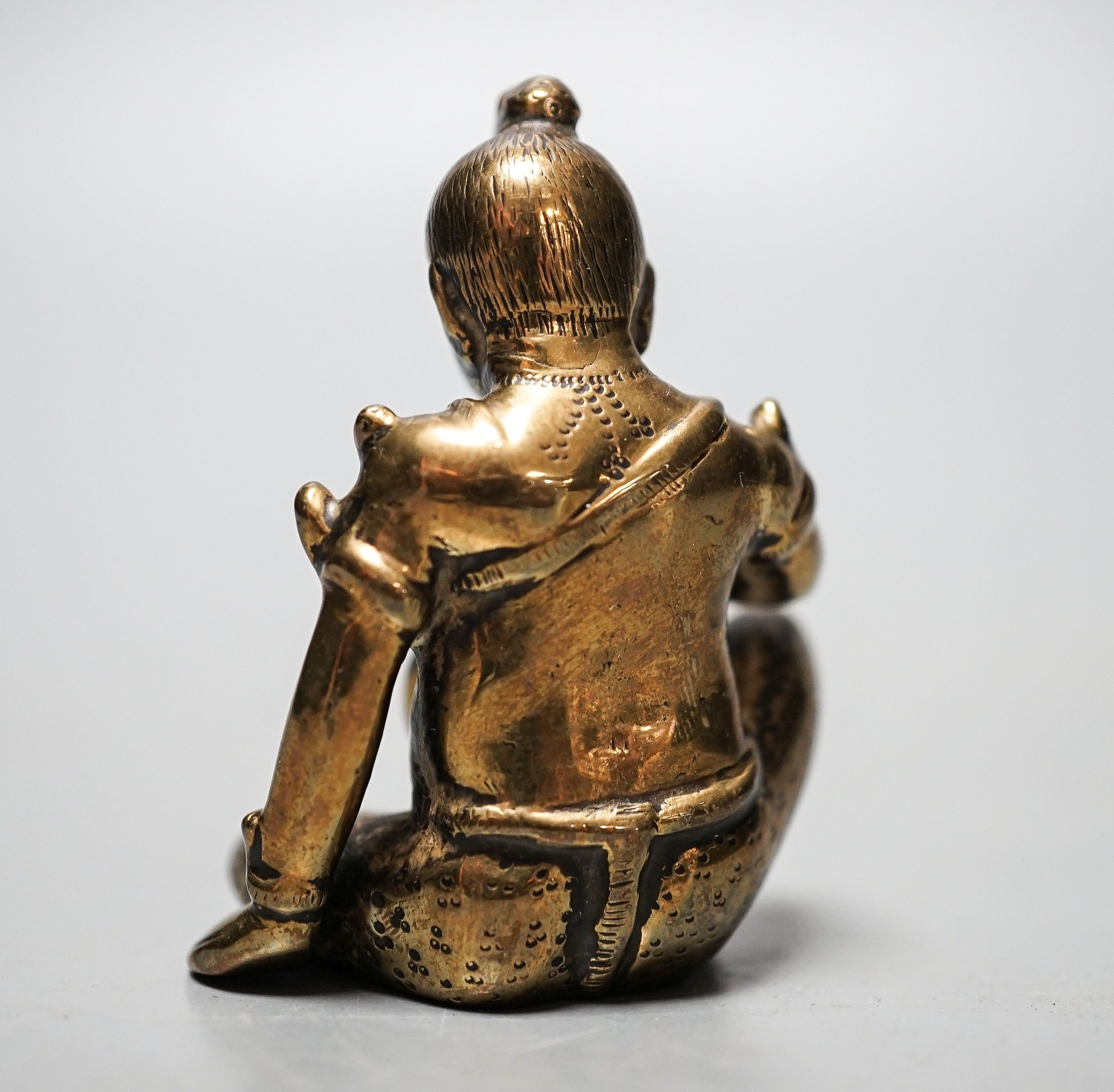 A 19th century bronze Buddhist seated figure 5.5cm